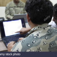 Computer Spreadsheet Software With Regard To An Afghan Border Police Officer, Left, Practices Using Spreadsheet
