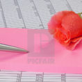 Notepad Spreadsheet Inside Rose And Notepad On A Spreadsheet  License For £6.20 On Picfair