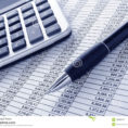 Spreadsheet Calculator Intended For Pen And Calculator On Cash Financial Spreadsheet Stock Image  Image